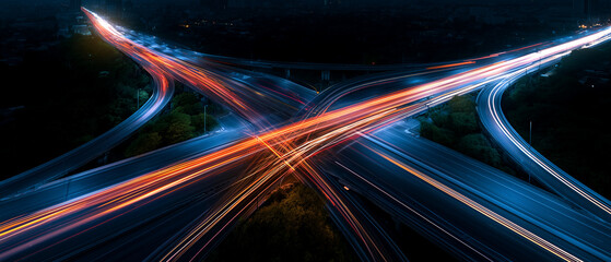 Aerial Night View of Highway Interchange Light Trails © toheartlove