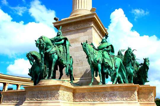 BUDAPEST, HUNGARY - AUGUST 31, 2025: Millennium Monument on Heroes' Square. The Seven Chieftains of the Magyars are depicted as seven mounted equestrian statues at the base of the 36-meter monument