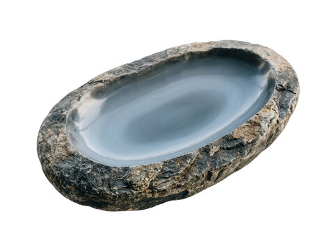Plato de piedra natural con forma ovalada y centro pulido de color gris, ideal para decoraci&oacute;n o como bebedero de terrario, aislado sobre fondo blanco.