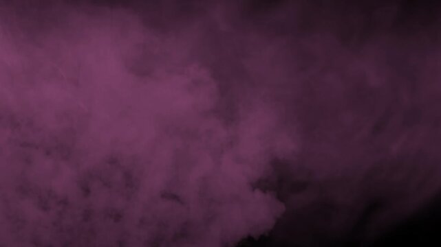 Gentle pink smoke haze rolling smoothly across bottom left on black background