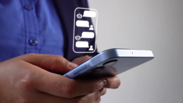 Professional businesswoman checking her mobile phone with an animation showing a chatbot interface on a smartphone.