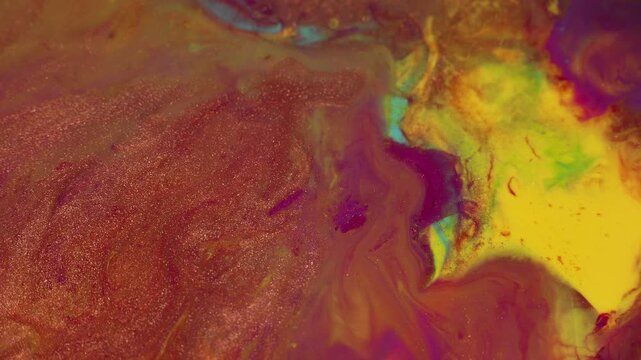 Abstract colorful paint swirl in macro slow motion video