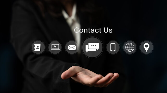 A professional businesswoman extends her hand, featuring various communication icons on a dark background. Ideal for marketing and consultancy themes on outreach strategies. Gantry