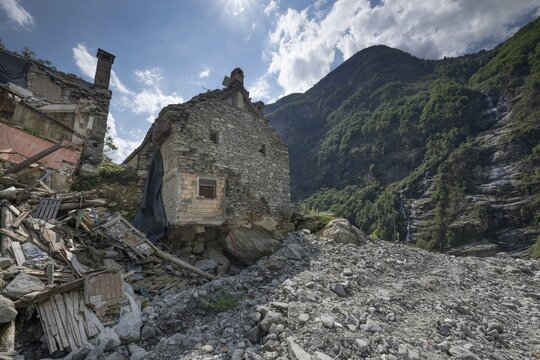 Devastation of a house due to debris and boulders, as a result of heavy rock and debris flow on the night of June 29-30, 2024 following heavy rains, Fontana, Bavona Valley or Val Bavona, Maggia Valley, Tessin, Switzerland
