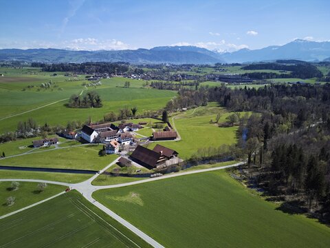 Frauenthal Cistercian Abbey, the oldest in Switzerland, with the Alps with the Rigi in the back, Hagendorn, Canton of Zug, Switzerland