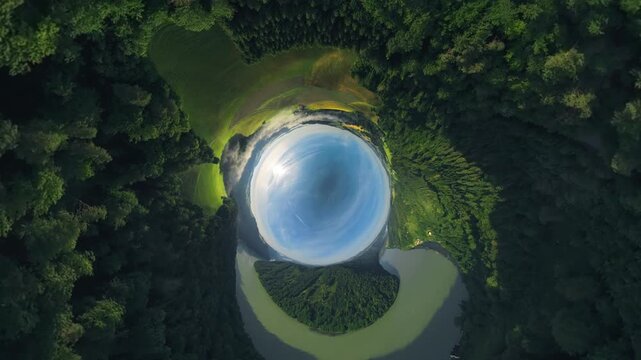 Creative drone footage of the Danube Valley transitioning from an inverted planet view into a tiny planet effect and smoothly back to the inverted perspective over the scenic landscape.