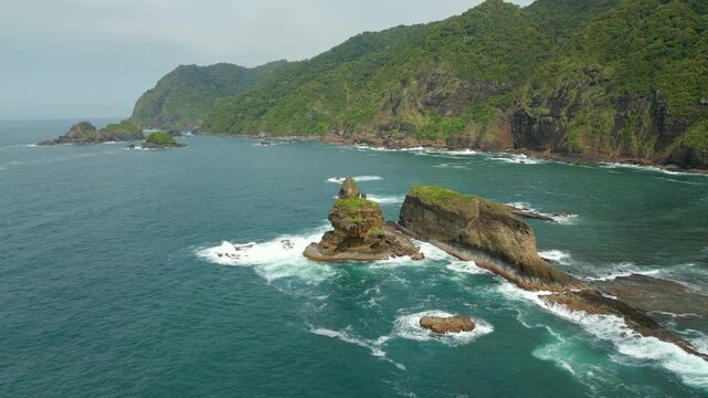 Java Indonesia Wild Rugged South Coast Pantai Papuma Jember Mountains Erosion Ocean Drone Track Right 4K 60FPS