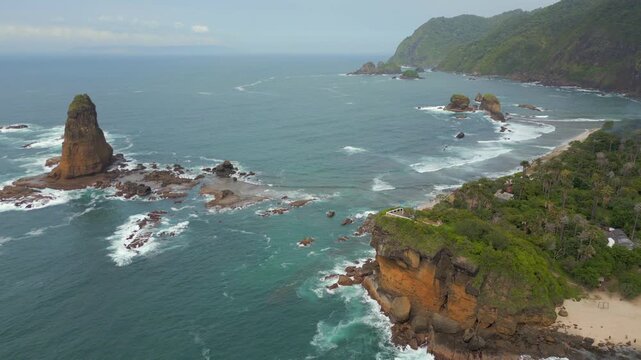 Wild Pantai Papuma Jember South Java Rugged Coastline Indonesia Drone Track Back 4K 60FPS