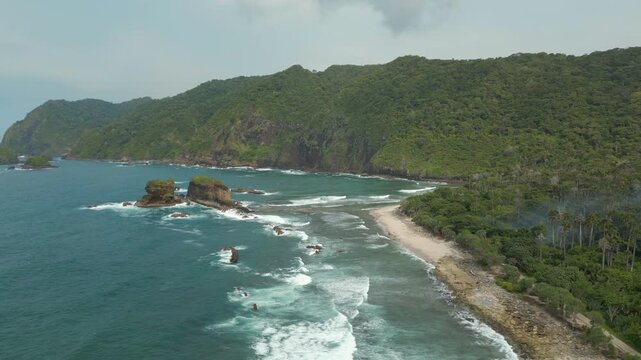 Rugged Wild South Coast Of Java Indonesia Pantai Papuma Jember Drone Track Left 4K 60FPS