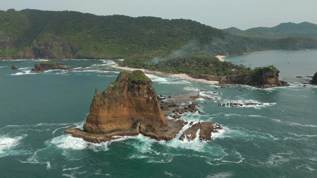 Pulau Kajang Dramatic Cliffs And Strong Waves South Coast Indonesia Jember Drone Circling 4K 60FPS