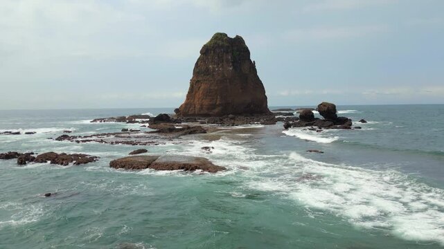 Cinematic Rock Island Pulau Kajang Waves Crashing Papuma Beach Jember Java Indonesia Drone Slow Track In 4K 60FPS