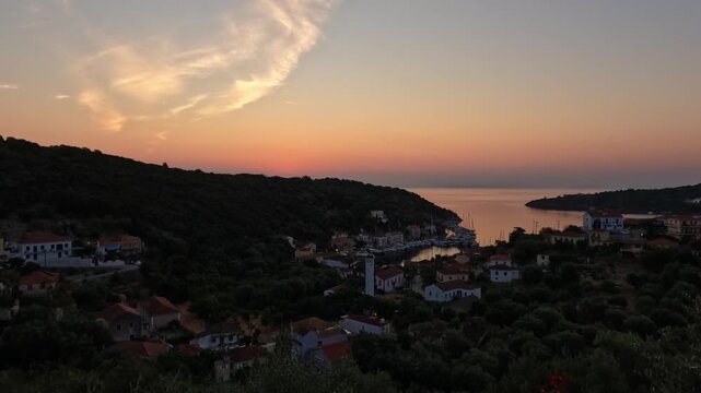 Mesmerisingly beautiful timelapse of sunrise at Kioni Bay showing boats coming and going, Ithaca, Greek Islands - med distance