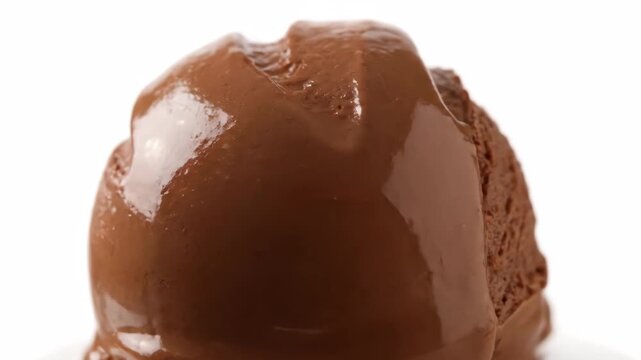 Decadent Scoop of Chocolate Ice Cream Extreme Close-Up Isolated on White Background, Showing Glossy Texture and Rich Brown Color