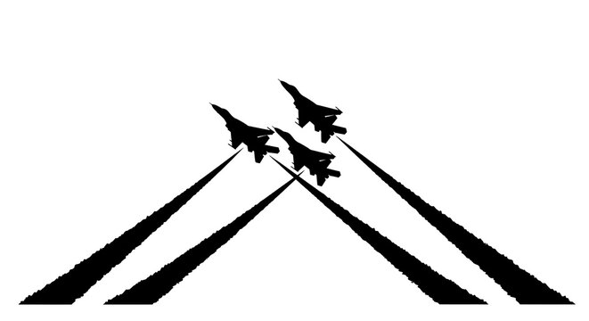 Silhouette of three fighter jets flying in formation