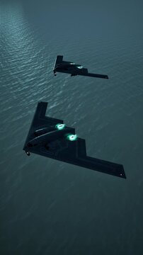 B-2 stealth bomber aircraft flying at high speed over the ocean water, strategic air force concept, 3D animation