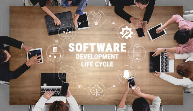 Collaborative Workspace with Diverse Professionals Engaged in Software Development Life Cycle with Digital Devices and Visual Graphics Quark.