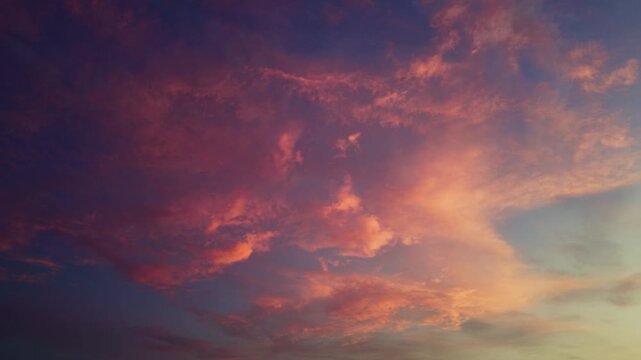 Dusky Cloudscape Fills The Sky With Layered Clouds During The Evening Twilight. Low-angle Shot