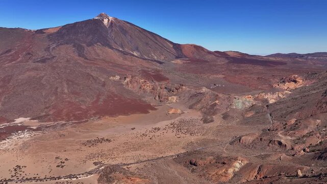 Aerial drone view of the spectacular Roques de Garc&iacute;a rock formations and volcanic landscape at the foot of Mount Teide in Teide National Park, Tenerife, Canary Islands, Spain.
