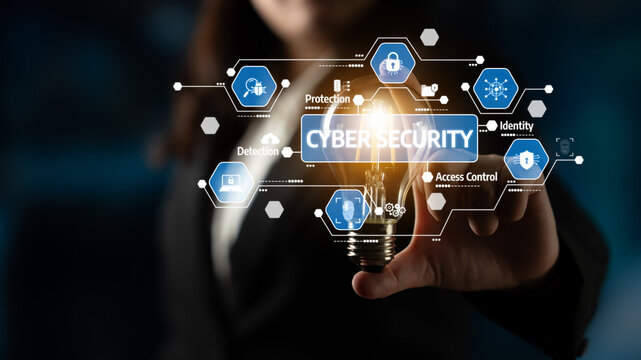 This stock photo illustrates fundamental concepts in cyber security with graphics and a light bulb symbolizing innovation and strategic thinking in digital safety. Tessel