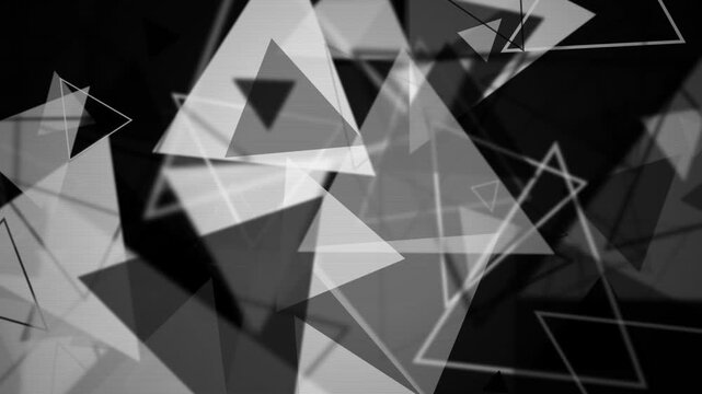 Abstract white triangles flying forward on a dark background, suitable for technology presentations, digital backdrops and video transitions