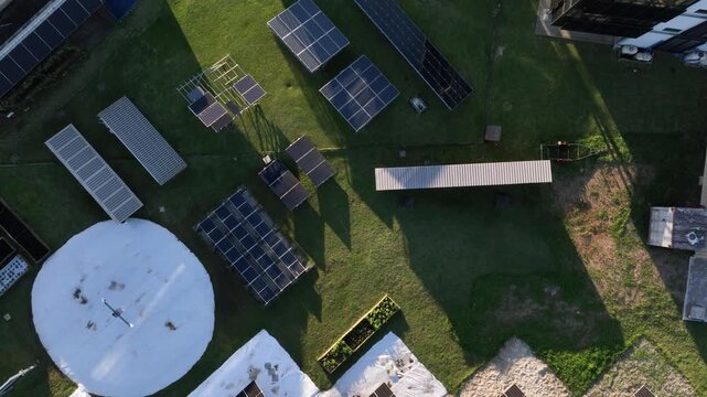 Solar Energy Technology Center with Rooftop Solar Panels, Ground-Mounted Arrays and Photovoltaic Research Systems in Florian&oacute;polis, Brazil. Aerial View.