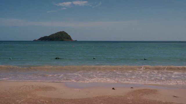 4K Scenic view of tropical ocean coastline and island with clear blue sky copy space.