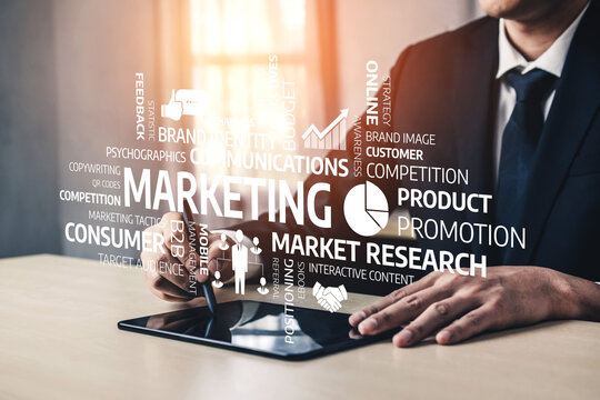 A professional setting showcasing hands using a tablet, emphasizing marketing concepts like product promotion, consumer research, and innovative strategies in business. Tessel