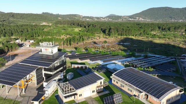 Solar Energy Technology Center with Rooftop Solar Panels, Ground-Mounted Arrays and Photovoltaic Research Systems in Florian&oacute;polis, Brazil. Aerial View.