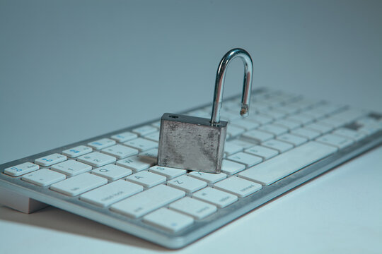 Padlock on a computer keyboard. The concept of computer security.