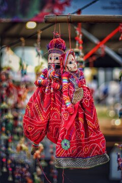 Colorful Traditional Rajasthani Kathputli Puppets Hanging At Indian Handicraft Market