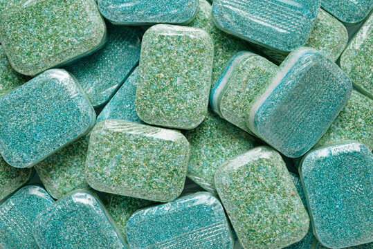 Dishwasher detergent tablets for household kitchen cleaning.