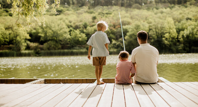 Relaxing afternoon fishing by the serene lake with loved ones