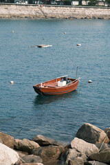 Close-up of small orange fishing boats on the beach in Stanley, Hong Kong © Steve