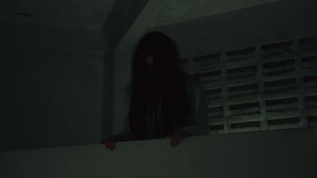 Scary halloween ghost figure, black long hair obscuring face, peers from dark room, evoking chilling psychopath night atmosphere perfect for horror themes, day or dead makeup and costumes.