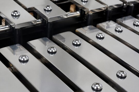 Xylophone metal bars aligned on instrument surface