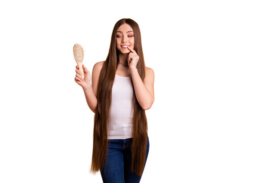 Close up photo beautiful her she lady arm hand recommend new hair brush very long brown hair great condition curls result use wear casual white tank-top jeans denim isolated pastel beige background