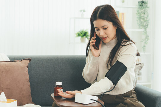 Woman Using Telehealth Service for Online Medical Consultation at Home