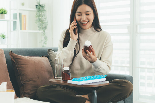 Woman Using Telehealth Service for Online Medical Consultation at Home