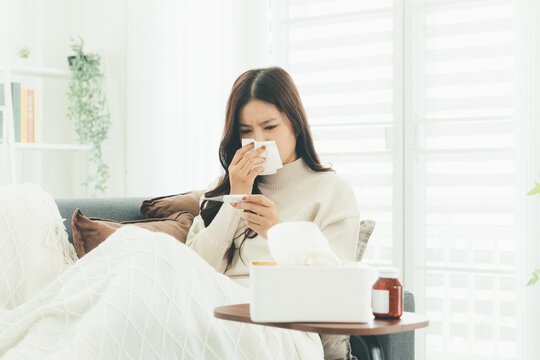 Woman Using Telehealth Service for Online Medical Consultation at Home