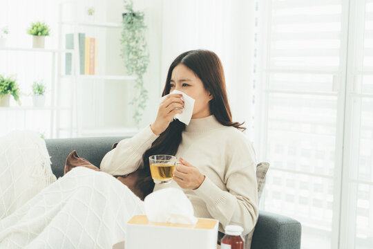 Woman Using Telehealth Service for Online Medical Consultation at Home