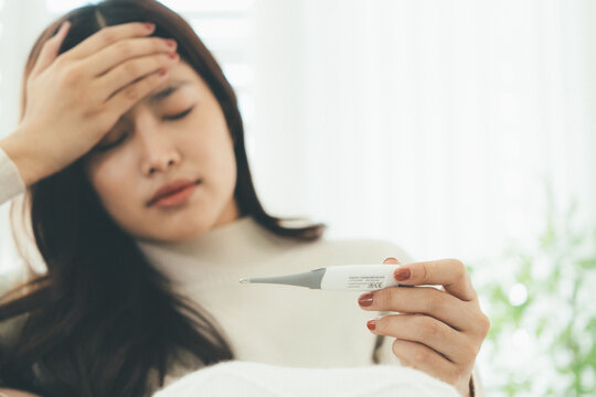 Woman Using Telehealth Service for Online Medical Consultation at Home