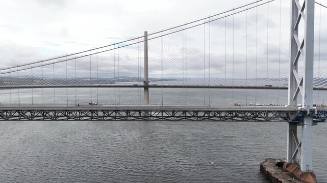 Cars driving on the forth road bridge over firth of forth