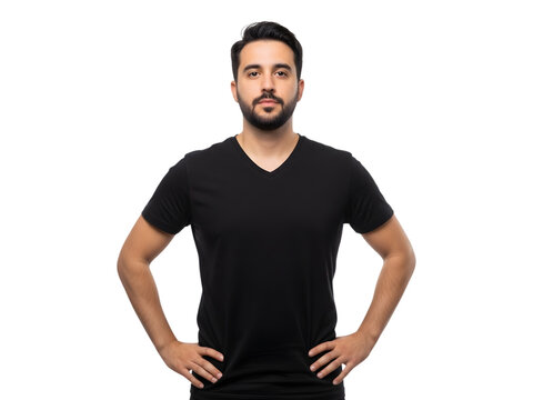 A handsome man with a beard wearing a black v-neck shirt standing confidently