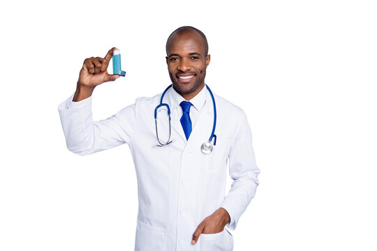 Photo of family doc dark skin guy hold inhaler asthma attack advising medical prescription against self-treatment concept wear stethoscope lab coat isolated grey color background