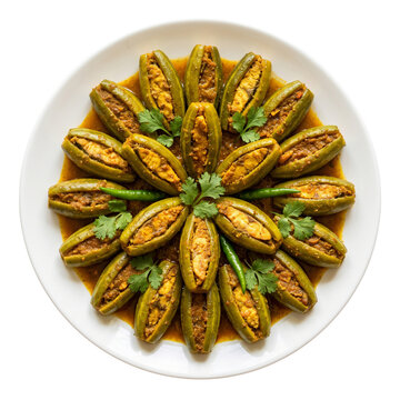 Traditional Potoler Dorma (stuffed pointed gourd) arranged geometrically on a white porcelain dish transparent background