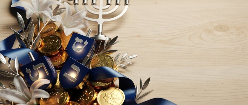 Hanukkah arrangement with dreidels, gelt, and menorah on wood. Blue and gold festive decorations with olive branches and white flowers. Jewish holiday concept, ideal for seasonal marketing.