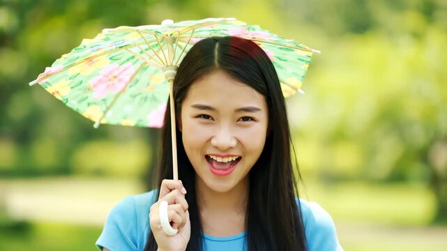 Girl holding a flower umbrella and smiling, girl holding a flower umbrella and smiling