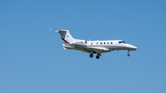 Embraer Phenom 300 private airplane NetJets Europe lands at ZRH Zurich international airport