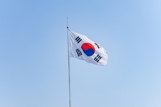 The national flag of the Republic of Korea (South Korea), also known as the Taegeukgi. Odusan Unification Observatory, Paju is a city in Gyeonggi Province, South Korea.