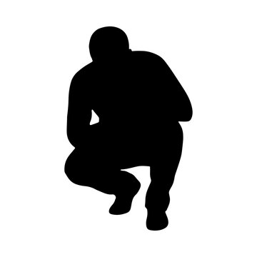 Man crouching down silhouette isolated on transparent background